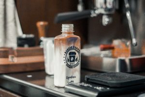 Rancak Coffee with bottle signature latte open cap